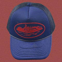 Corteiz Blue Trucker Hat with Red Cruise Ship Graphic